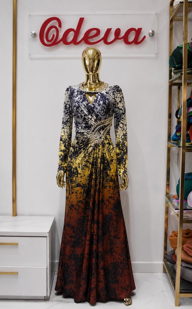 Lycra long gown with side pleat and beaded neck
